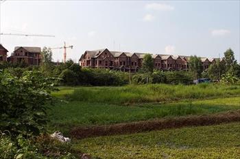 Cán bộ, công chức về hưu có được mua đất nông nghiệp?